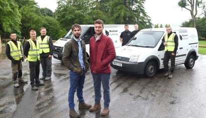 Front LR Thomas Jordan and Chris Whiteoak of Blackoak Surfacing in Nelson pictured with their team