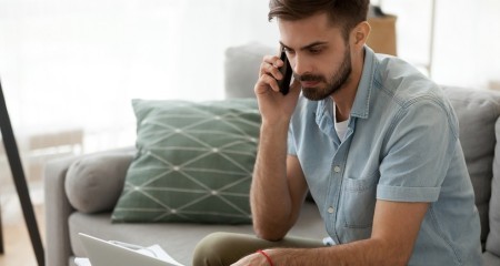 Man on phone at home BANNER